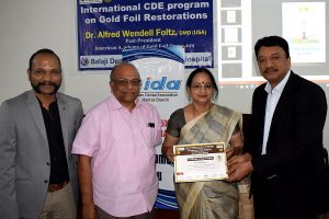 Prof Balaji presenting Prof Mahalaxmi with a certificate of appreciation at the completion of her lecture at the CDE program