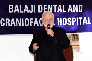 Prof Foltz delivering his keynote lecture on direct gold foil restorations at the CDE program