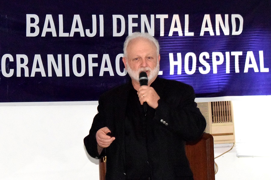 Prof Foltz delivering his keynote lecture on direct gold foil restorations at the CDE program