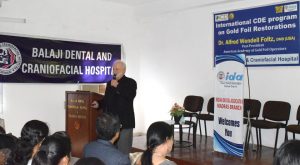 Prof Foltz delivering his keynote lecture on direct gold foil restorations at the CDE program