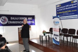 Prof Foltz delivering his keynote lecture on direct gold foil restorations at the CDE program