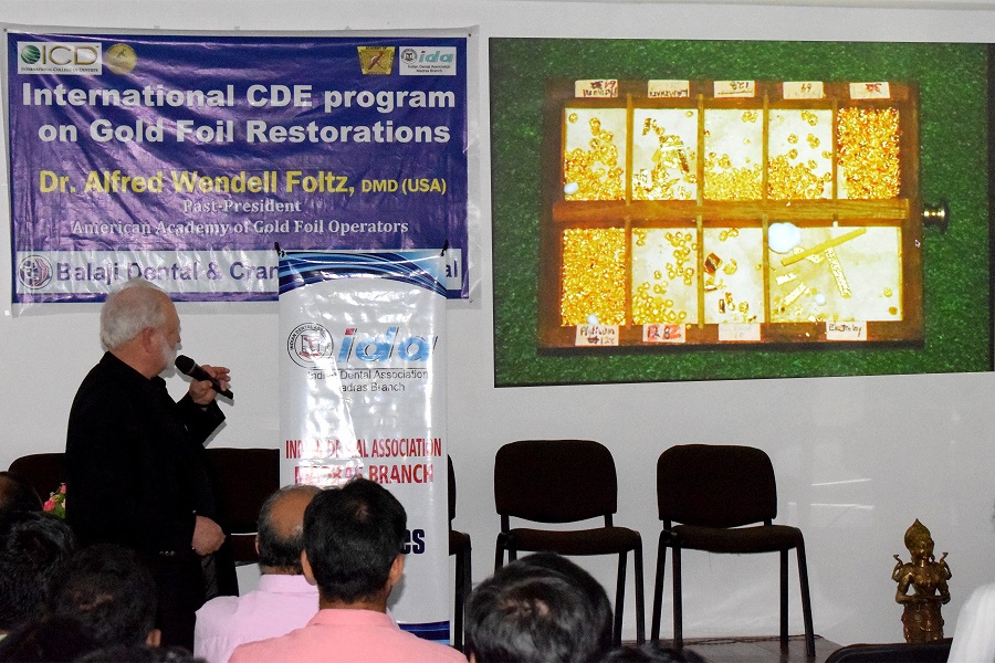 Prof Foltz delivering his keynote lecture on direct gold foil restorations at the CDE program