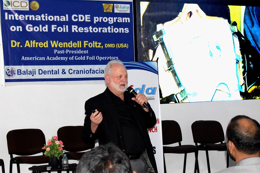 Prof Foltz delivering his keynote lecture on direct gold foil restorations at the CDE program