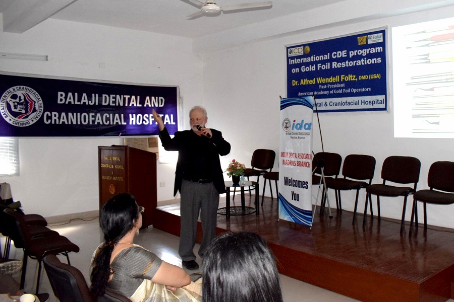 Prof Foltz delivering his keynote lecture on direct gold foil restorations at the CDE program