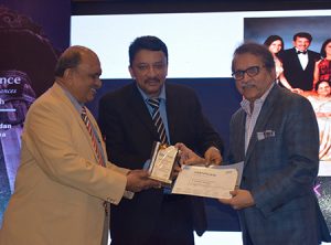 Dr. Balaji and Dr. Meshram presenting Dr. Sandesh Mayekar with a Certificate of Appreciation at the end of Dr. Mayekar’s keynote speech “Functional Smile Designing” at the conference
