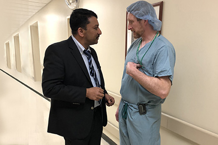 Prof S M Balaji with Dr James Murphy discussing a case scheduled for later in the day-
