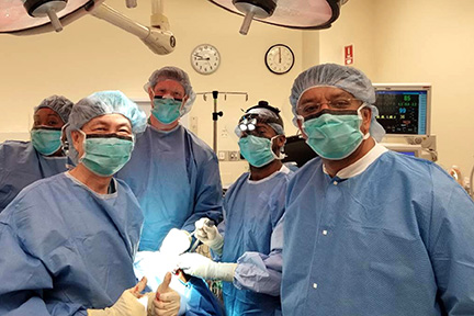 Dr S M Balaji with Dr Fung and Dr Murphy during his visit to the Operating Room as an observer
