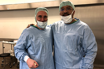 Prof S M Balaji with Prof Nicolai Adolphs outside the Operating Room at the Charite Universitatsmedizin Berlin