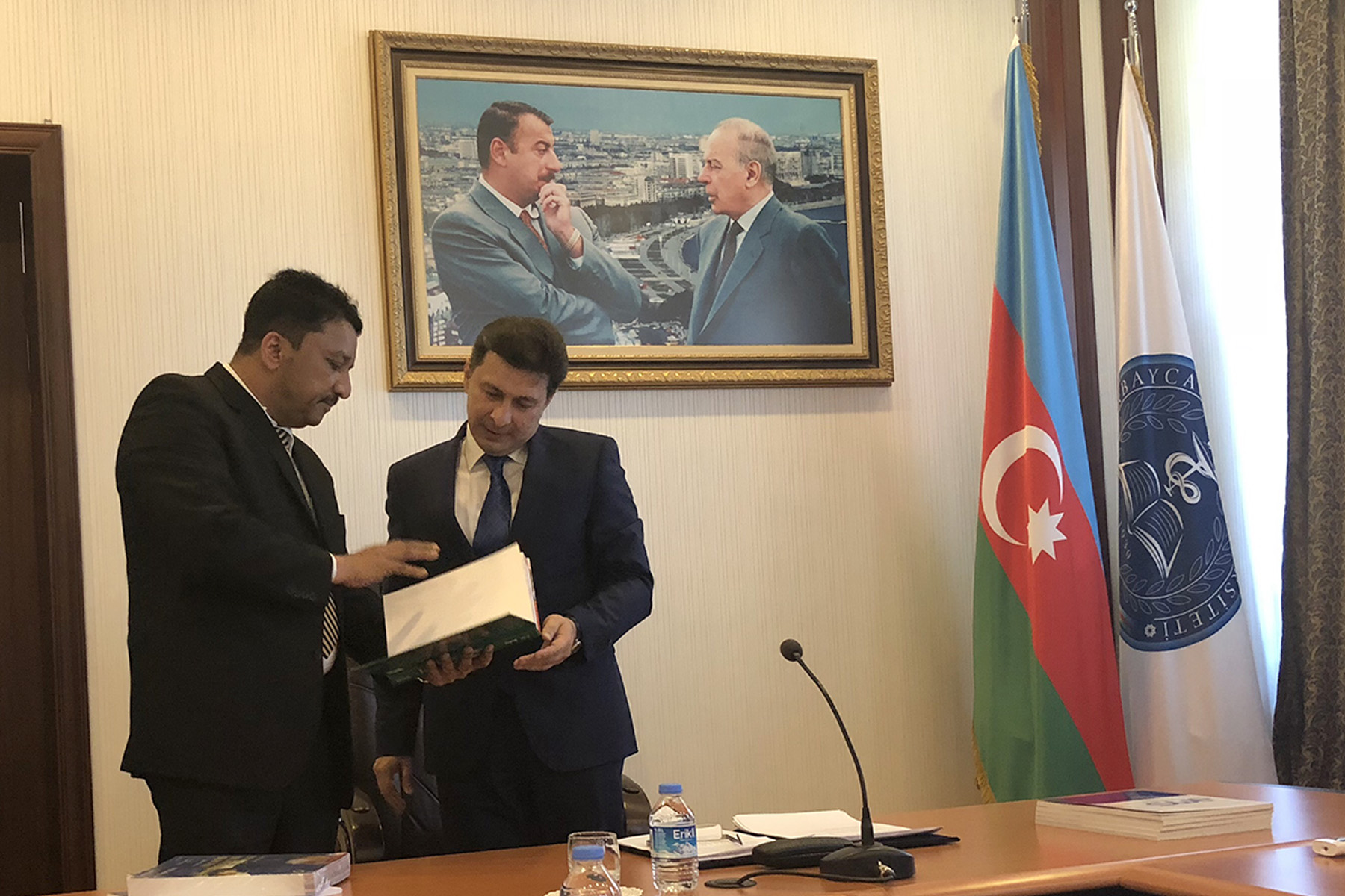 Dr SM Balaji elucidating the salient points of the textbook to the Rector, His Excellency Dr Garay Chingiz Garaybayli