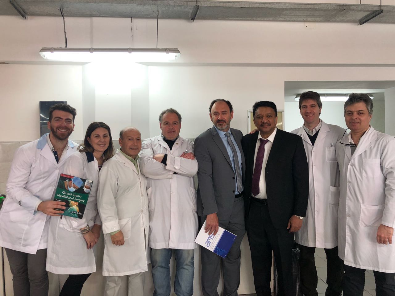 Dr SM Balaji with the staff and residents of the department after presenting the Clinical Craniomaxillofacial Surgery textbook and AMS journal