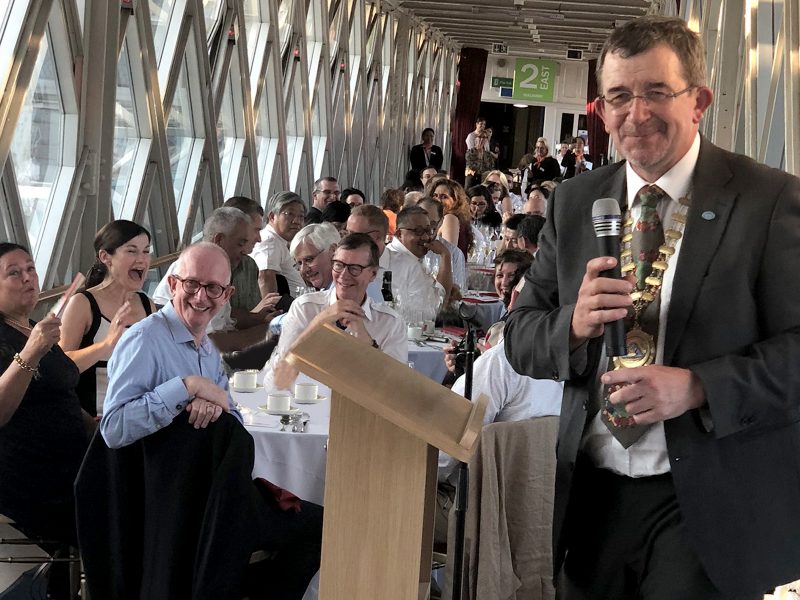 Dr Angus Walls shares a lighter moment with other delegates