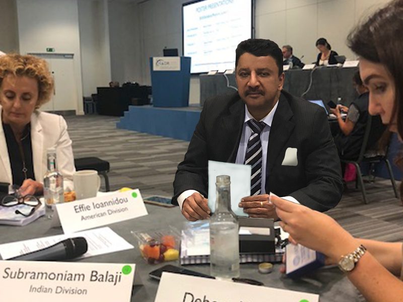 Dr SM Balaji seated with delegates at the IADR Council meeting