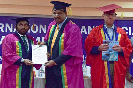 Dr SM Balaji receives certificate from minister