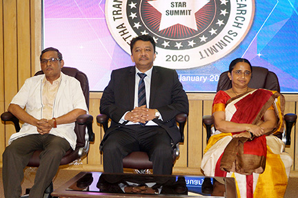 Dr SM Balaji seated on the dais at the commencement of the STAR Summit in Saveetha Dental College